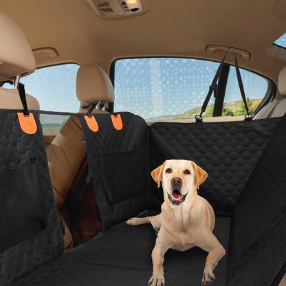 Dog on a rear-seat hammock with quilted seat and backrest coverage