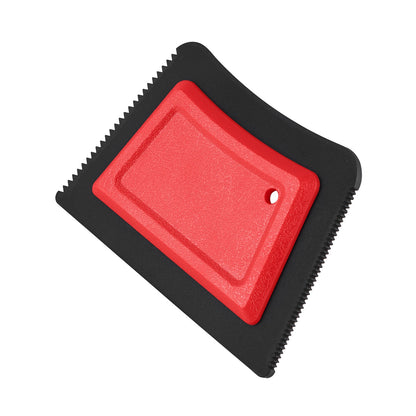 Alternate angle of the red pet hair remover and serrated black edge